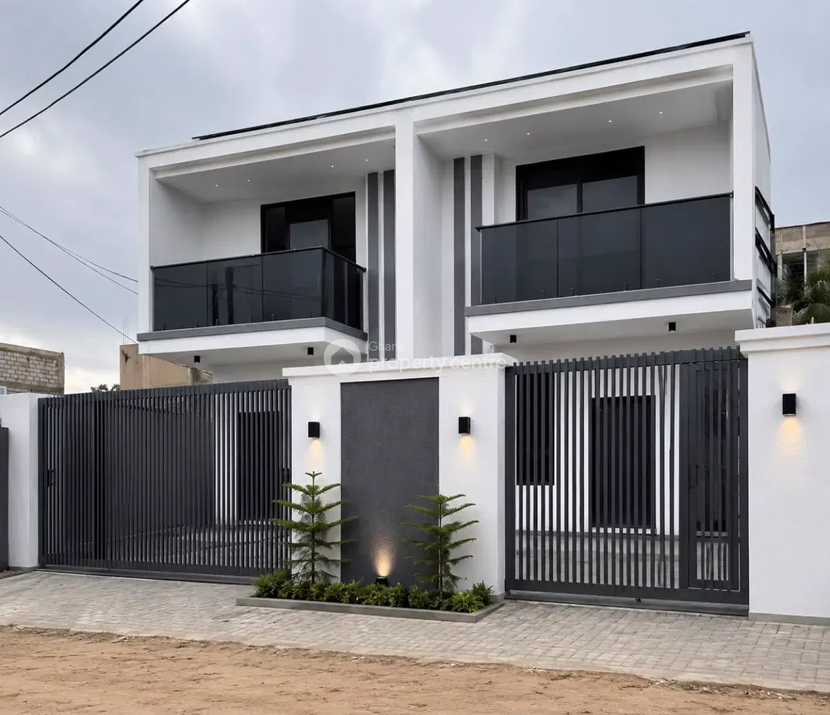 Modern white dual-balcony house in Ghana